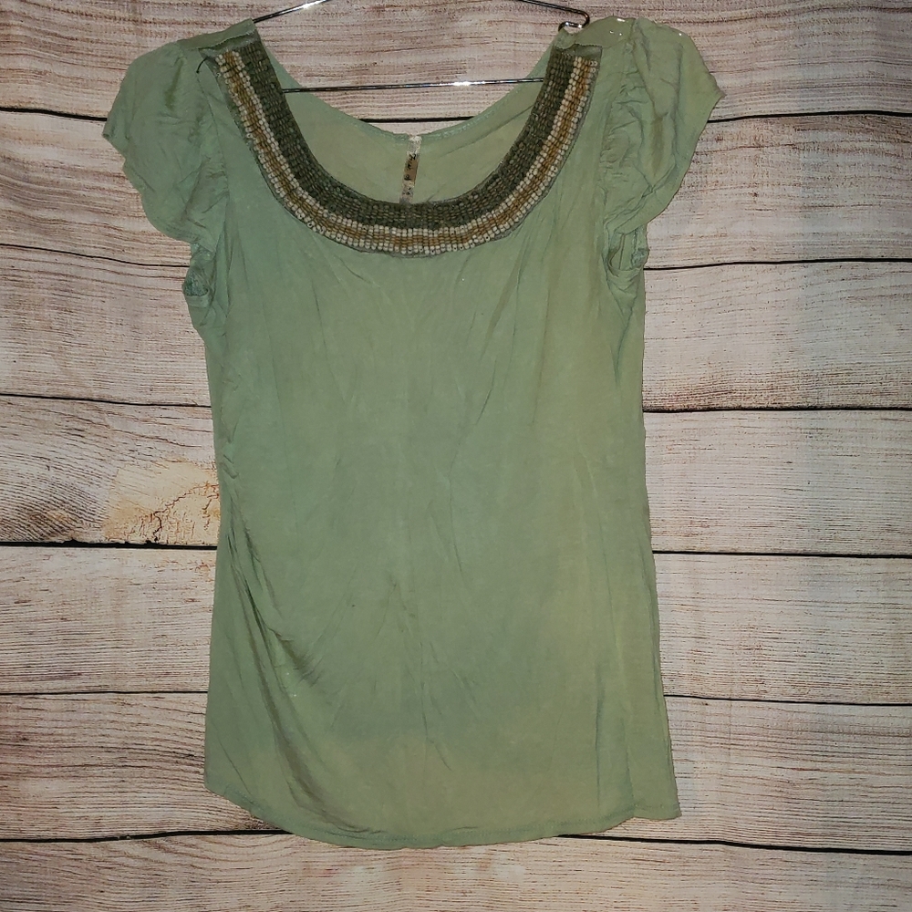 Cute green beaded neck shirt